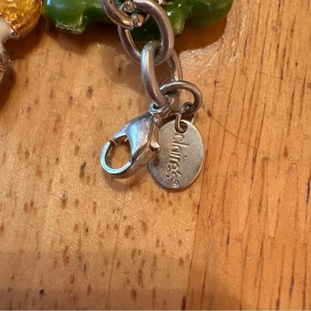 Claires silver charm